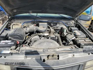1998 GMC Suburban with VIN 1GKFK16RXWJ721305, listed as a Copart auction lot 64112165 with 197,756 mi miles and Clean title. Bid and sale history available at DreamBid. Image 12.