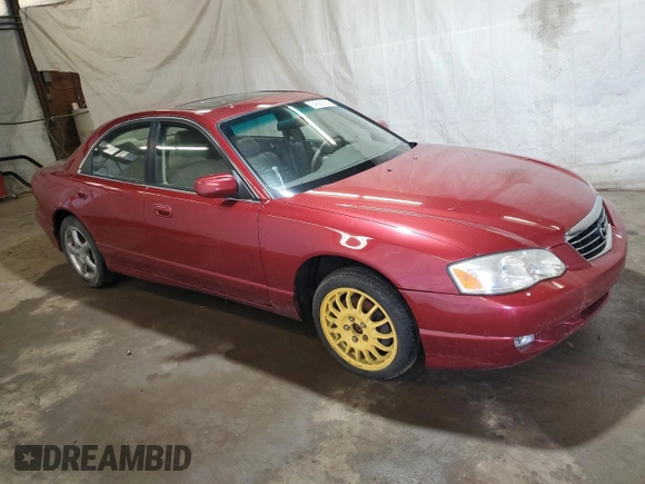 2001 Mazda Millenia S z VIN JM1TA222111707236, wystawiony jako Copart lot #54690874 z przebiegiem 107 530 mil mil oraz Szkoda całkowita • Salvage title. Historia ofert i sprzedaży dostępna na DreamBid. Obrazek 4.
