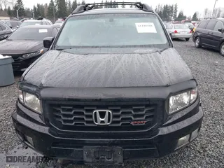 2011 Honda Ridgeline RTS with VIN 5FPYK1F44BB004240, listed as a IAAI auction lot 41248168 with 133,327 mi miles. Bid and sale history available at carsss.com. Image 12.