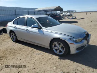 2015 BMW 3 Series 320i z VIN WBA3B1C52FK141604, wystawiony jako Copart lot #58096835 z przebiegiem 150 773 mil mil oraz Szkoda całkowita • Salvage title. Historia ofert i sprzedaży dostępna na DreamBid. Obrazek 4.