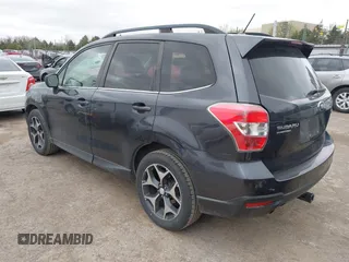 2015 Subaru Forester 2.0XT Premium with VIN JF2SJGDC1FH823888, listed as a IAAI auction lot 41829859 with 90,743 mi miles. Bid and sale history available at carsss.com. Image 3.