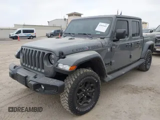2022 Jeep Gladiator Willys with VIN 1C6JJTAMXNL137237, listed as a IAAI auction lot 41947651 with 55,199 mi miles and . Bid and sale history available at DreamBid. Image 17.