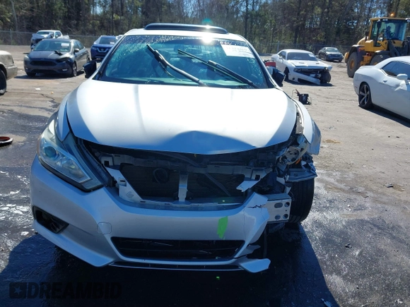 2016 Nissan Altima S with VIN 1N4AL3AP0GC120758, listed as a IAAI auction lot 41394469 with 137,936 mi miles and . Bid and sale history available at DreamBid. Image 13.