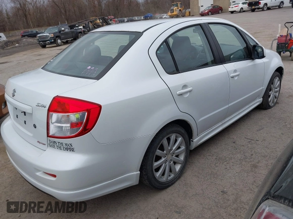 2012 Suzuki SX4 with VIN JS2YC5A52C6300339, listed as a IAAI auction lot 41829263 with 63,717 mi miles and . Bid and sale history available at DreamBid. Image 4.