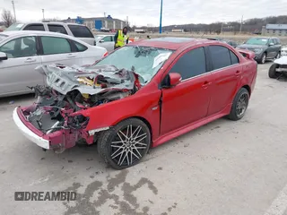 2016 Mitsubishi Lancer GT with VIN JA32U8FW1GU012988, listed as a IAAI auction lot 41498905 with 94,727 mi miles. Bid and sale history available at carsss.com. Image 2.
