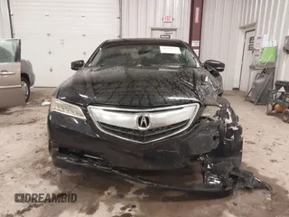 2016 Acura TLX z VIN 19UUB1F38GA000451, wystawiony jako IAAI lot #41259757 z przebiegiem 98 627 mil mil oraz . Historia ofert i sprzedaży dostępna na DreamBid. Obrazek 12.