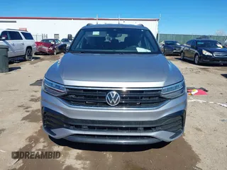 2022 Volkswagen Tiguan SE R-Line Black z VIN 3VVCB7AX4NM008121, wystawiony jako IAAI lot #41671382 z przebiegiem 71 674 mil mil oraz . Historia ofert i sprzedaży dostępna na DreamBid. Obrazek 12.