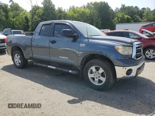 2010 Toyota Tundra with VIN 5TFUW5F10AX110293, listed as a Copart auction lot 64685105 with 256,875 mi miles and Salvage title. Bid and sale history available at DreamBid. Image 4.