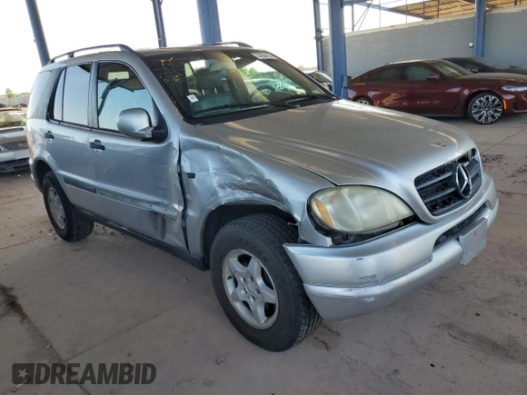 2000 Mercedes-Benz M-Class with VIN 4JGAB54E1YA193102, listed as a Copart auction lot 74294404 with 202,107 mi miles and Salvage Title. Bid and sale history available at carsss.com. Image 4.