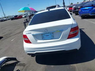 2014 Mercedes-Benz C C 250 Sport with VIN WDDGF4HB3EA965176, listed as a IAAI auction lot 41870150 with 211,085 mi miles. Bid and sale history available at carsss.com. Image 17.