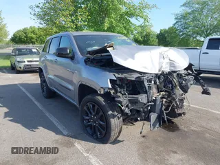 2021 Jeep Grand Cherokee Laredo X with VIN 1C4RJFAGXMC676138, listed as a IAAI auction lot 42223325 with 23,239 mi miles and . Bid and sale history available at DreamBid. Image 1.