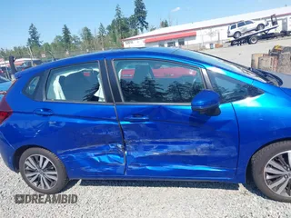 2015 Honda Fit EX-L z VIN 3HGGK5H83FM732503, wystawiony jako IAAI lot #42397823 z przebiegiem 87 522 mil mil oraz . Historia ofert i sprzedaży dostępna na DreamBid. Obrazek 13.