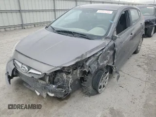 2013 Hyundai Accent GS with VIN KMHCT5AE9DU117548, listed as a Copart auction lot 52261285 with 118,783 mi miles and Salvage title. Bid and sale history available at DreamBid. Image 1.