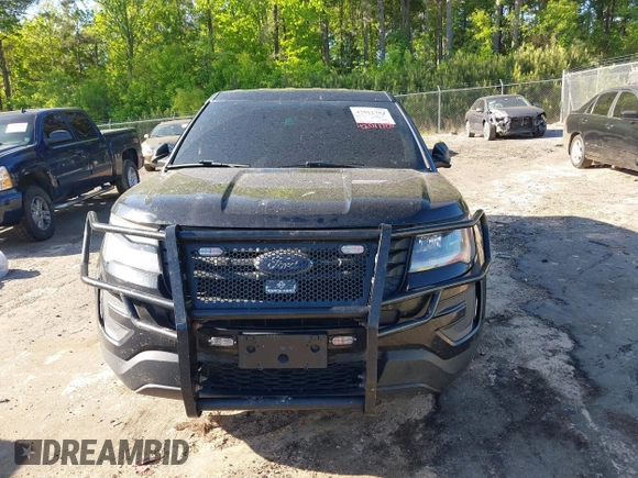 2019 Ford Police Interceptor Utility z VIN 1FM5K8AT0KGA31584, wystawiony jako IAAI lot #42011705 z przebiegiem 145 304 mil mil oraz . Historia ofert i sprzedaży dostępna na DreamBid. Obrazek 12.
