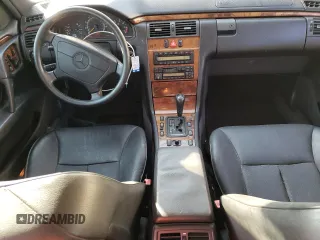 1998 Mercedes-Benz E-Class with VIN WDBJF65F1WA711193, listed as a Copart auction lot 76052034 with 168,935 mi miles and Salvage Title. Bid and sale history available at carsss.com. Image 8.