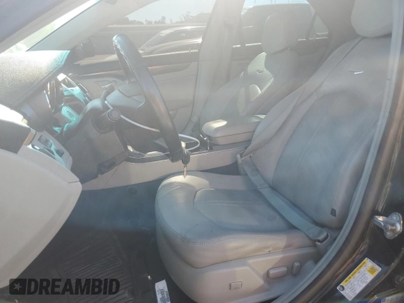 2013 Cadillac CTS Luxury с VIN 1G6DG5E50D0111154, выставлен на аукционе Copart как лот 75872384 с пробегом 102 151 миль миль и На запчасти • Non repairable. История ставок и продаж доступна на DreamBid. Изображение 7.