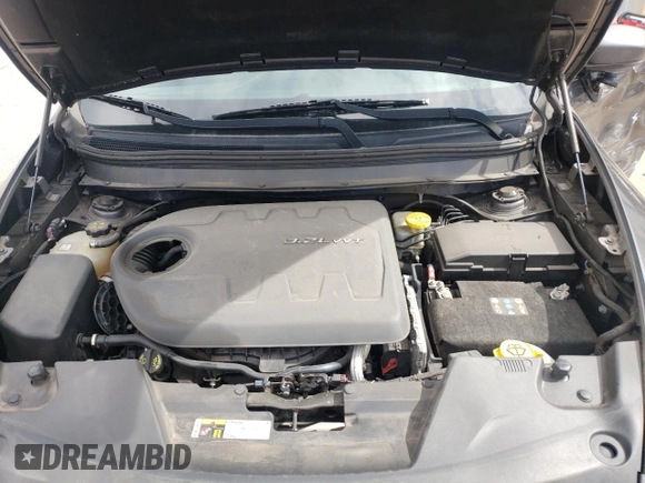 2014 Jeep Cherokee Trailhawk with VIN 1C4PJMBS6EW140981, listed as a Copart auction lot 58260325 with 97,036 mi miles and Salvage title. Bid and sale history available at DreamBid. Image 12.