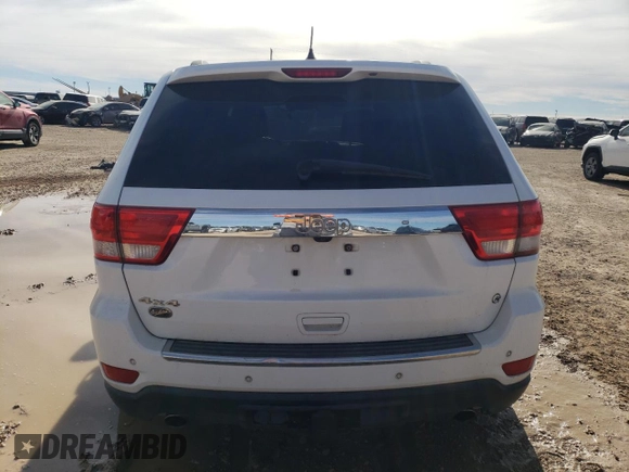 2013 Jeep Grand Cherokee Overland with VIN 1C4RJFCT2DC650336, listed as a Copart auction lot 83830304 with 129,858 mi miles and Clean Title. Bid and sale history available at carsss.com. Image 6.
