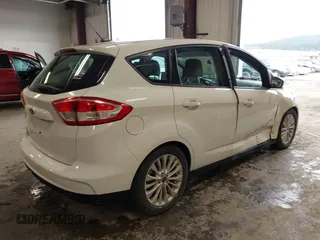 2017 Ford C-Max SE z VIN 1FADP5EU8HL107626, wystawiony jako IAAI lot #42279162 z przebiegiem 79 697 mil mil oraz . Historia ofert i sprzedaży dostępna na DreamBid. Obrazek 4.