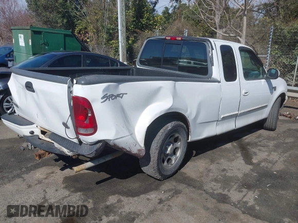 2002 Ford F-150 XL with VIN 1FTRX17L32NA13159, listed as a IAAI auction lot 41653814 with 435,395 mi miles. Bid and sale history available at carsss.com. Image 4.