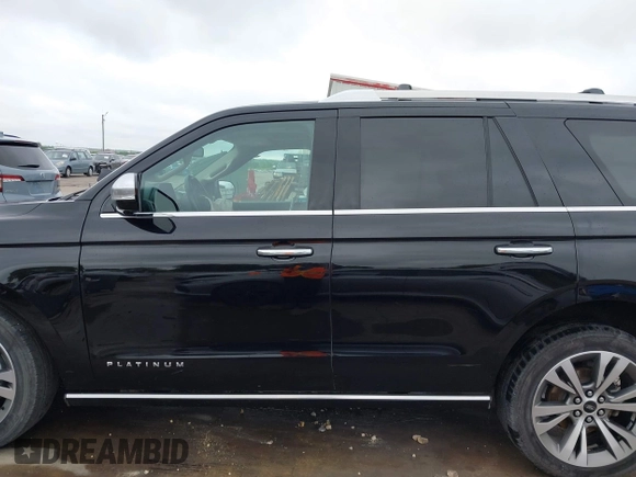 2019 Ford Expedition Platinum with VIN 1FMJU1MT8KEA02325, listed as a IAAI auction lot 41861772 with 77,124 mi miles. Bid and sale history available at carsss.com. Image 15.