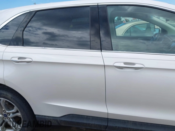 2017 Ford Edge Titanium z VIN 2FMPK3K98HBB28403, wystawiony jako IAAI lot #42103773 z przebiegiem 131 525 mil mil oraz . Historia ofert i sprzedaży dostępna na DreamBid. Obrazek 13.