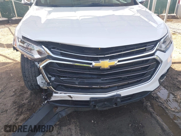 2018 Chevrolet Traverse LT Cloth z VIN 1GNEVGKWXJJ270664, wystawiony jako IAAI lot #42176492 z przebiegiem 73 534 mil mil oraz . Historia ofert i sprzedaży dostępna na DreamBid. Obrazek 6.