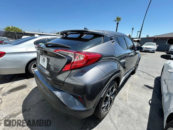 2018 Toyota C-HR XLE with VIN NMTKHMBX1JR004008, listed as a Copart auction lot 61504265 with 106,802 mi miles and Clean title. Bid and sale history available at DreamBid. Image 4.