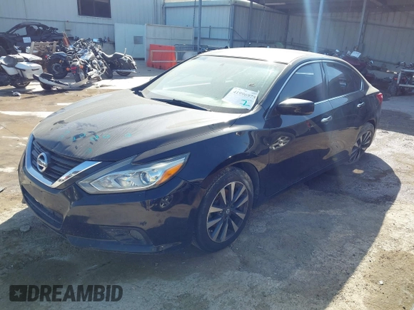 2017 Nissan Altima SV with VIN 1N4AL3AP2HC171809, listed as a IAAI auction lot 41996975 with 137,534 mi miles and . Bid and sale history available at DreamBid. Image 2.