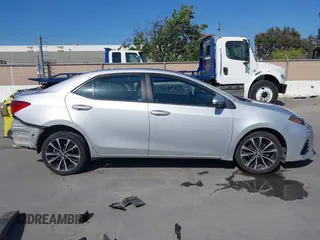2017 Toyota Corolla L z VIN 5YFBURHE6HP652091, wystawiony jako IAAI lot #42131898 z przebiegiem 380 284 mil mil oraz . Historia ofert i sprzedaży dostępna na DreamBid. Obrazek 13.