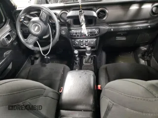 2023 Jeep Wrangler Sport Altitude with VIN 1C4HJXDG6PW635120, listed as a Copart auction lot 77864744 with 31,830 mi miles and Salvage Title. Bid and sale history available at DreamBid. Image 8.