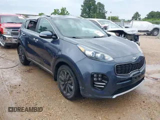 2019 Kia Sportage EX z VIN KNDPN3AC3K7569882, wystawiony jako IAAI lot #42094311 z przebiegiem 67 816 mil mil oraz . Historia ofert i sprzedaży dostępna na DreamBid. Obrazek 1.