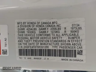 2025 Honda Civic Sedan Hybrid Sport with VIN 2HGFE4F87SH301266, listed as a IAAI auction lot 41729597 with 5,502 mi miles. Bid and sale history available at carsss.com. Image 9.