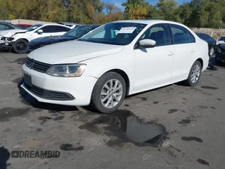 2012 Volkswagen Jetta Sedan SE w/Convenience with VIN 3VWDX7AJ7CM377081, listed as a IAAI auction lot 40756653 with 120,019 mi miles. Bid and sale history available at carsss.com. Image 2.