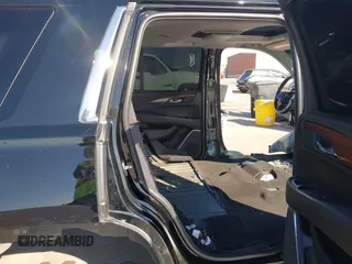 2015 Cadillac Escalade Premium z VIN 1GYS3NKJ5FR655370, wystawiony jako IAAI lot #41764570 z przebiegiem Nie podano mil oraz . Historia ofert i sprzedaży dostępna na DreamBid. Obrazek 8.