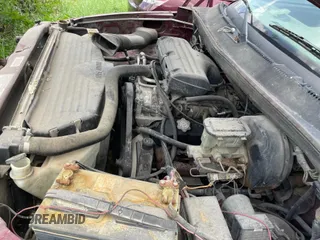 1995 Dodge 1500 z VIN 1B7HC16Y2SS102291, wystawiony jako IAAI lot #42312890 z przebiegiem 381 090 mil mil oraz . Historia ofert i sprzedaży dostępna na DreamBid. Obrazek 8.