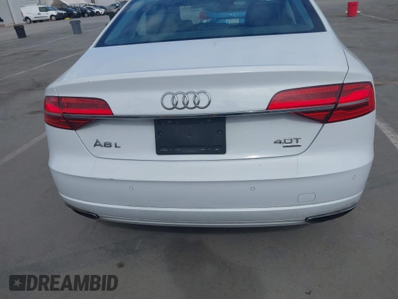 2016 Audi A8 Sport z VIN WAU43AFD3GN011061, wystawiony jako IAAI lot #42034532 z przebiegiem 109 877 mil mil oraz . Historia ofert i sprzedaży dostępna na DreamBid. Obrazek 16.