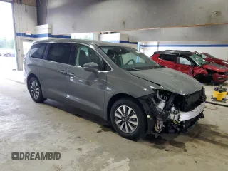 2021 Chrysler Pacifica Hybrid Touring L with VIN 2C4RC1L72MR596429, listed as a Copart auction lot 53859345 with 97,218 mi miles and Salvage title. Bid and sale history available at DreamBid. Image 4.