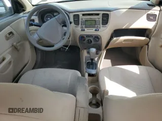 2009 Kia Rio LX with VIN KNADE223896456292, listed as a Copart auction lot 54990605 with 61,220 mi miles and Salvage Title. Bid and sale history available at DreamBid. Image 8.