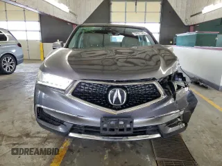 2018 Acura MDX Technology с VIN 5J8YD4H57JL016129, выставлен на аукционе Copart как лот 58921365 с пробегом 99 051 миль миль и Списание • Salvage title. История ставок и продаж доступна на DreamBid. Изображение 5.