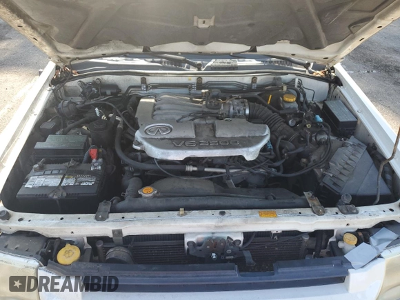 2003 Infiniti QX4 with VIN JNRDR09X33W250292, listed as a Copart auction lot 56020474 with 260,391 mi miles and Clean Title. Bid and sale history available at DreamBid. Image 11.