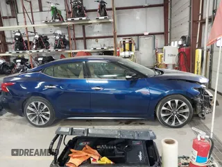 2016 Nissan Maxima SL with VIN 1N4AA6AP6GC425575, listed as a IAAI auction lot 41463093 with 135,920 mi miles and . Bid and sale history available at DreamBid. Image 13.