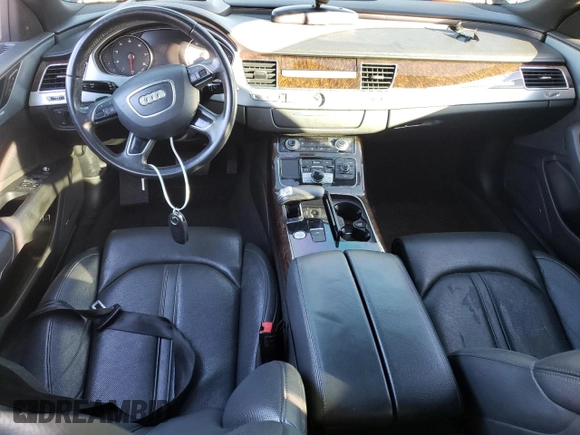 2015 Audi A8 z VIN WAUJGAFD9FN022023, wystawiony jako Copart lot #86048354 z przebiegiem Nie podano mil oraz Szkoda całkowita • Salvage title. Historia ofert i sprzedaży dostępna na DreamBid. Obrazek 8.