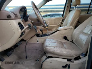 2002 Mercedes-Benz M-Class with VIN 4JGAB54E72A300774, listed as a Copart auction lot 75990134 with 312,541 mi miles and Salvage Title. Bid and sale history available at carsss.com. Image 7.