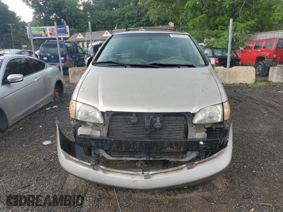 2003 Toyota Sienna LE with VIN 4T3ZF13C33U540296, listed as a Copart auction lot 62643745 with 143,727 mi miles and Salvage title. Bid and sale history available at DreamBid. Image 6.