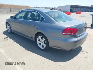 2014 Volkswagen Passat S with VIN 1VWAT7A30EC025433, listed as a IAAI auction lot 42197150 with 141,276 mi miles and . Bid and sale history available at DreamBid. Image 3.