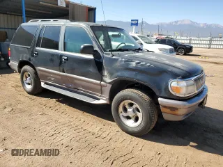 1997 Mercury Mountaineer z VIN 4M2DU52P5VUJ58731, wystawiony jako Copart lot #69710404 z przebiegiem 266 522 mil mil oraz Tytuł czysty. Historia ofert i sprzedaży dostępna na DreamBid. Obrazek 4.