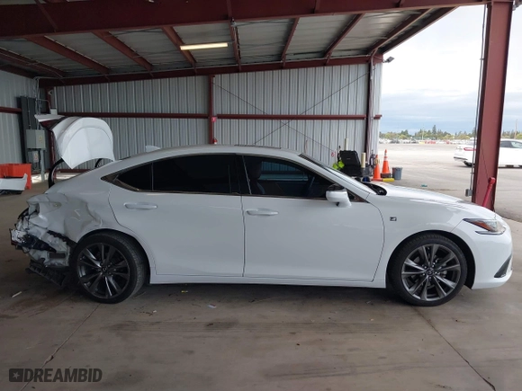 2019 Lexus ES with VIN 58ABZ1B14KU006880, listed as a IAAI auction lot 41782635 with 115,480 mi miles. Bid and sale history available at carsss.com. Image 14.