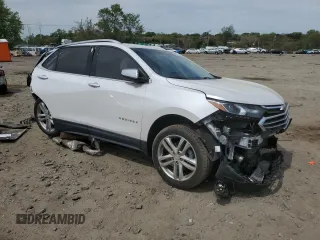 2019 Chevrolet Equinox Premier with VIN 2GNAXPEX8K6276748, listed as a Copart auction lot 52823745 with 90,163 mi miles and Salvage title. Bid and sale history available at DreamBid. Image 4.