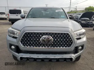 2019 Toyota Tacoma SR z VIN 3TMCZ5AN0KM227229, wystawiony jako Copart lot #54984895 z przebiegiem 244 400 mil mil oraz Czysty tytuł • Clean title. Historia ofert i sprzedaży dostępna na DreamBid. Obrazek 5.